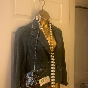 Multi colored with various women’s faces.